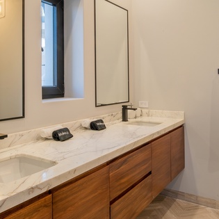 En suite bathroom with double sink