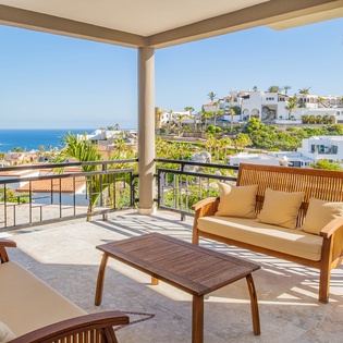 Outdoor lounge seating with ocean views