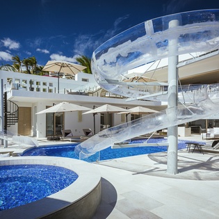 Poolside with water slide from Upper level