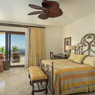 Bedroom suite with pocket door and ocean view