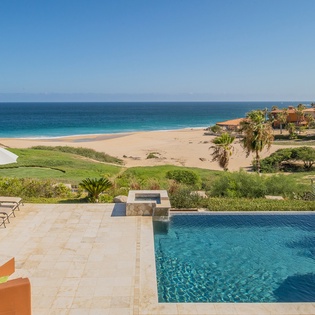 Lounge poolside with beach view