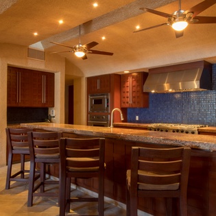 Spacious kitchen with bar stools