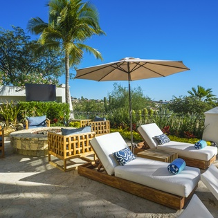 Unwind on your private sun loungers with plush cushions and tropical shade, where afternoon relaxation feels like paradise.