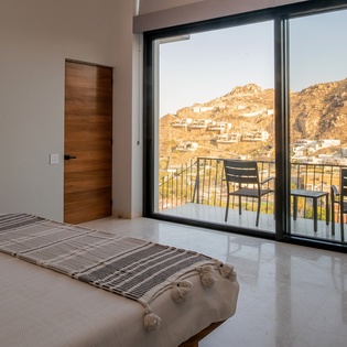 Bedroom suite with terrace access and fantastic views