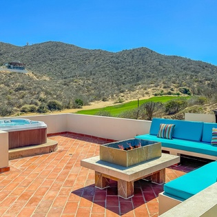 Rooftop terrace with hot tub and fire pit