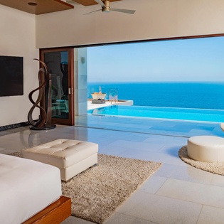 Bedroom suite with terrace access and view