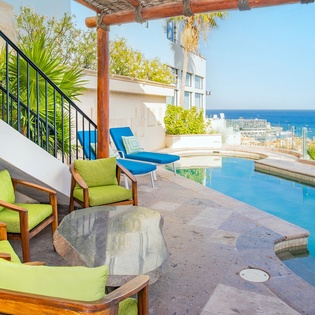 Outdoor patio seating with ocean view