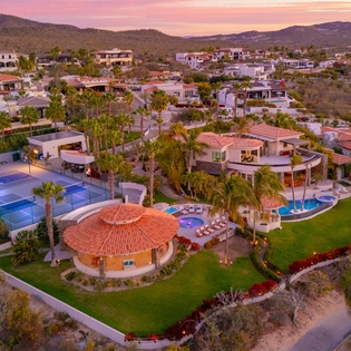 Bird's eye view of villa during sunset