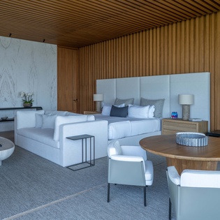 Bedroom suite with seating area