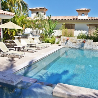 Sunny poolside and jacuzzi