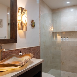 En suite bathroom with walk in shower