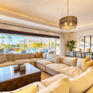 Spacious living room with patio access