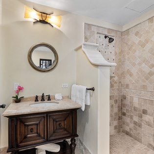 En suite bathroom with walk in shower
