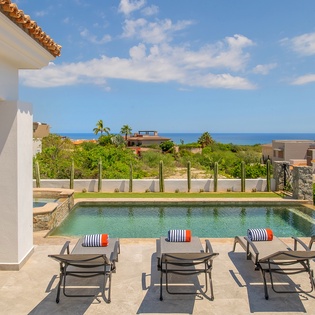 Sunny poolside with oceanview -1