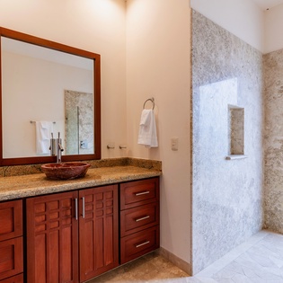 En suite bathroom with walk in shower