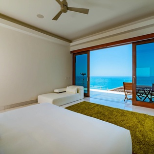 Bedroom suite with terrace access and view