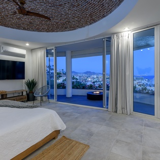 Bedroom suite with fire pit and views