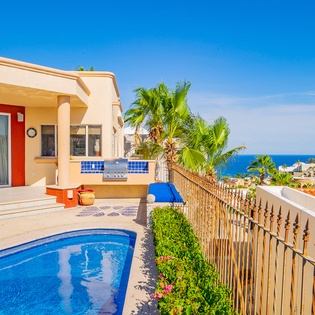 Poolside patio with ocean view