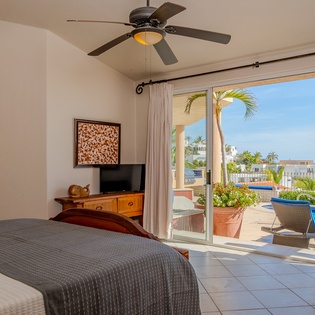 Bedroom suite with patio access