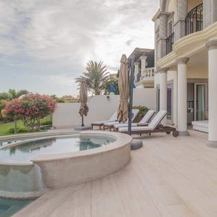 Jacuzzi and lounge chairs