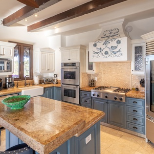 Fully equipped kitchen area with bar seating