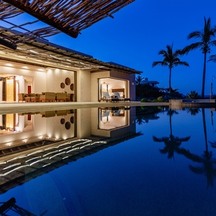 Poolside view of villa exterior