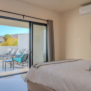 Bedroom suite with patio access