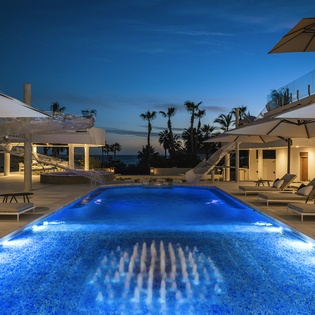 Swim during dusk with an ocean view