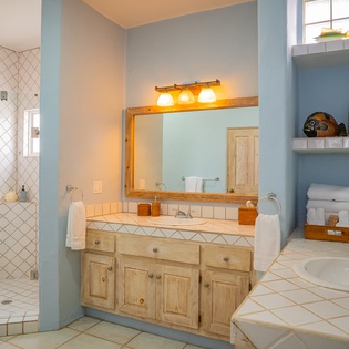 En suite bathroom with bath tub
