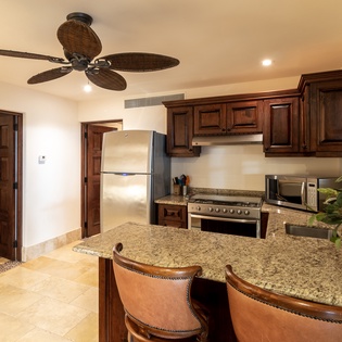 Fully equipped kitchen with bar seating
