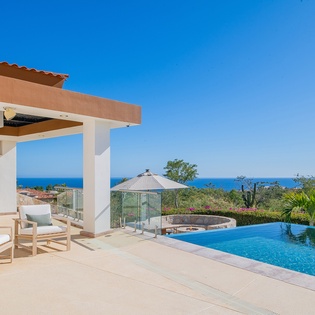 Poolside patio with ocean view