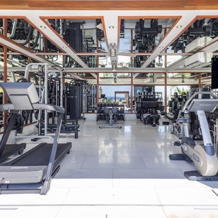 Your fully equipped fitness center features cardio machines, strength equipment, and modern facilities for energizing workouts.