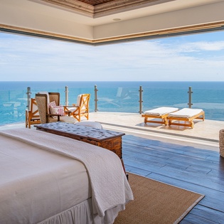 Bedroom suite with private terrace and ocean views