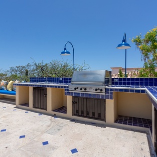 BBQ and outdoor seating area