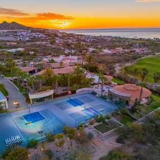 Bird's eye view of villa during sunset
