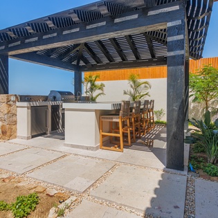 Bar seating with BBQ grill