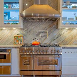 Your dream kitchen awaits with professional-grade stainless steel appliances, sleek marble backsplash, and ample prep space for crafting memorable vacation meals.