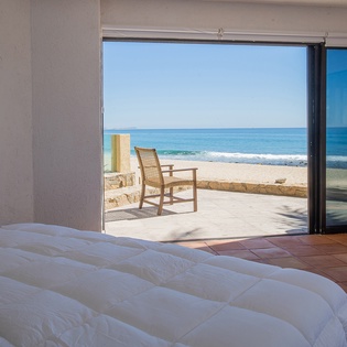 Bedroom suite with patio and beach access