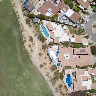 Aerial view of neighborhood featuring ack Nicklaus’ signature golf course