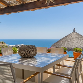 Savor morning coffee or sunset dinners at your private terrace table, where ocean breezes and stunning sea views create the perfect dining backdrop.