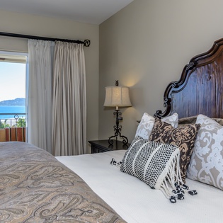 Bedroom suite with balcony and ocean views