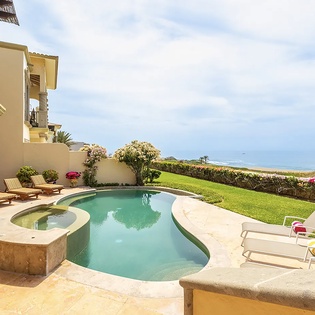 Poolside patio with ocean views