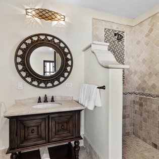 En suite bathroom with walk in shower