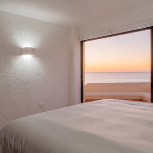 Bedroom suite with patio and beach access