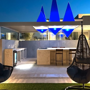 Evening views with hammock chairs and bar area