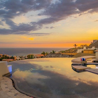 A spectacular coastal setting where your infinity pool overlooks the Pacific at golden hour, offering endless ocean views and front-row seats to stunning sunsets.