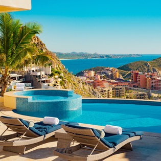 Scenic outdoor terrace with pool, jacuzzi and ocean views