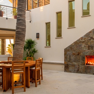 Casa Kokomo- villa exterior with fireplace