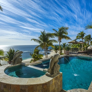 Poolside with incredible beachfront views