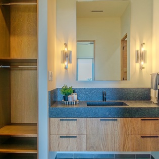 Your stylish bathroom vanity combines warm wood tones with sleek modern fixtures, creating the perfect space to refresh each morning.